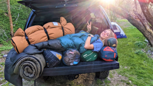 Woman with sleeping bags